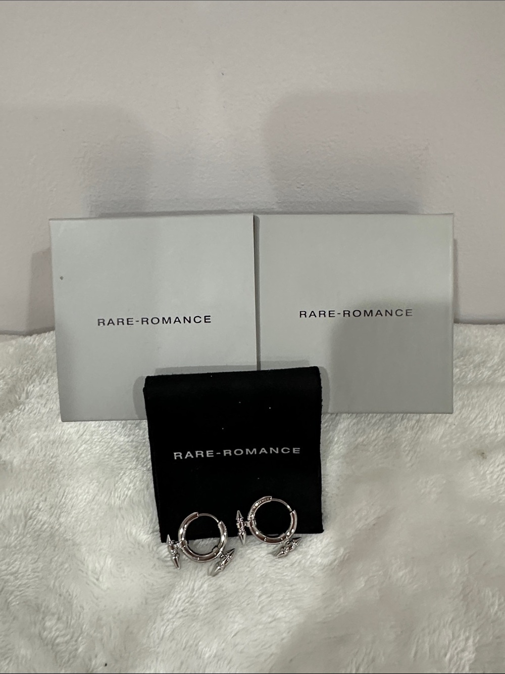 Polished Silver Hoop Earrings with Charm Accents